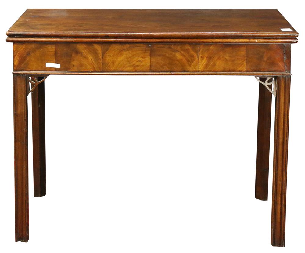 Georgian mahogany games table circa 1790: Georgian mahogany games table circa 1790, having a highly figured flip top opening to the felt playing surface, and rising on chamfered legs, 29"h x 36"w x 18"d