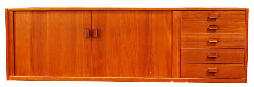Danish Modern Nils Johnson floating credenza: Danish Modern Nils Johnson floating credenza, executed in teak, having tambour doors and a bank of five drawers, brand mark to interior, 20.5"h x 67"w x 17.5"d