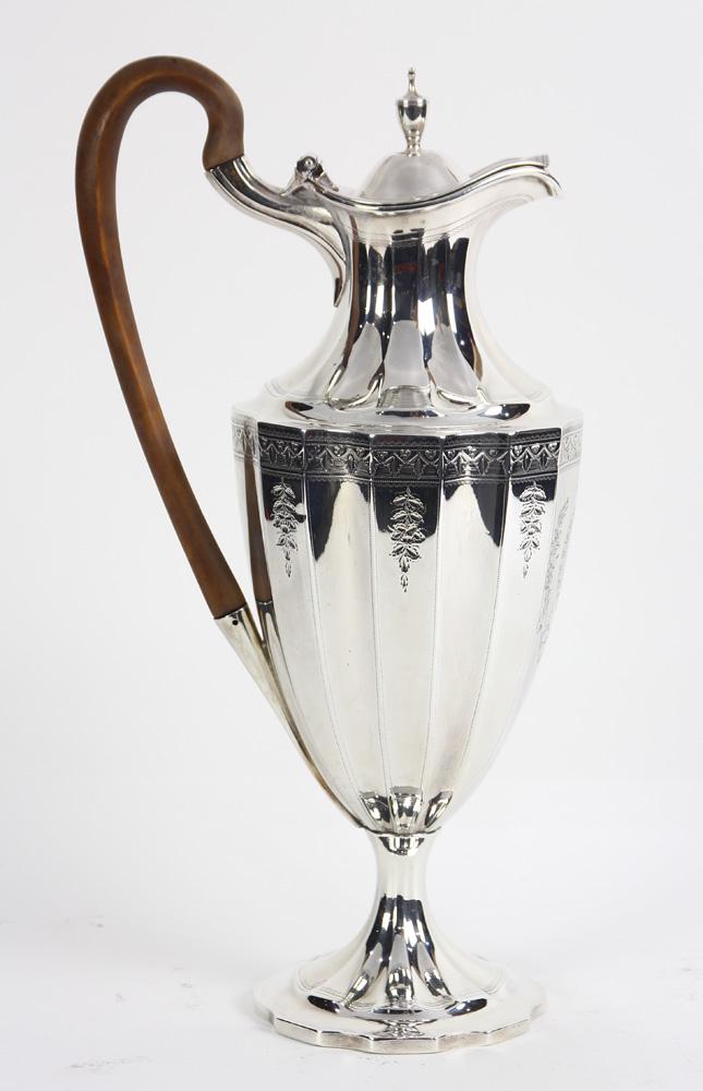 George III sterling jug, Charles Allbridge, London,: George III sterling jug, Charles Allbridge, London, circa 1791, the Neoclassical paneled urn form with swag banding and an oval medallion, fitted with a wood handle, a hinged lid with an urn finial, 1