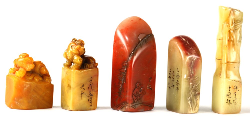 (Lot of 5) Group of Chinese Soapstone Seals: (Lot of 5) Chinese soapstone seals, two featuring mythical beasts; two with figures in landscape; and one of bamboo form with inscriptions, 3"h