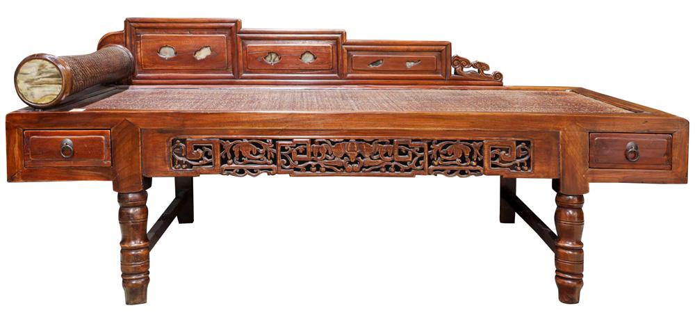 A Chinese Elmwood Daybed: A Chinese elm wood daybed with bamboo top and armrest, 28.75" w x 19.25" h x 67"l