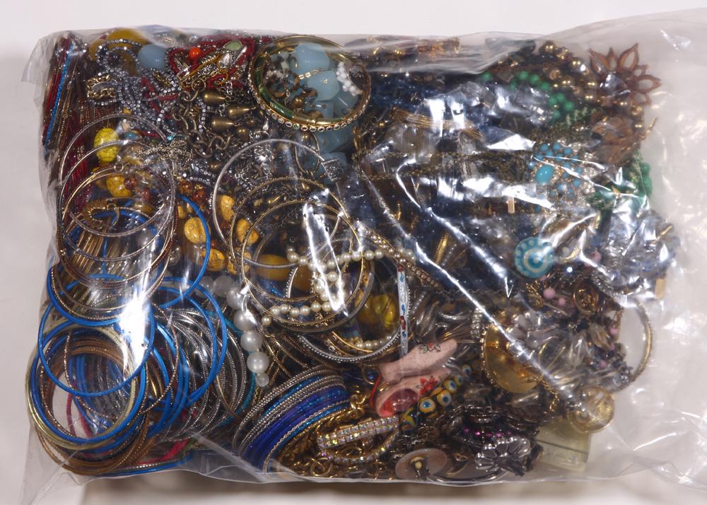 Collection of glass bead and costume jewelry: Collection of glass bead and costume jewelry Including many polychrome bangle bracelets, glass and plastic beads; together with many costume bracelets, earrings, necklaces and brooches