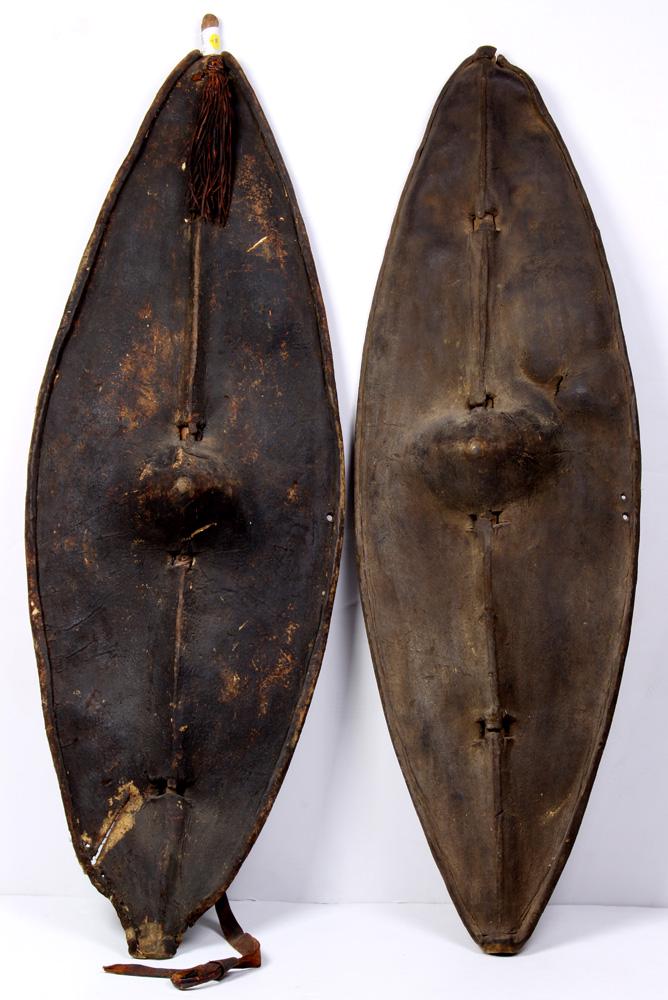 Two tribal shields: Two tribal shields, each 43"h
