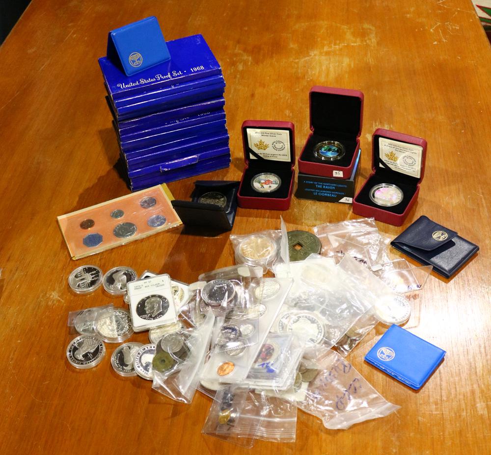 A group of assorted medals, coins, proof sets (1 of 4)