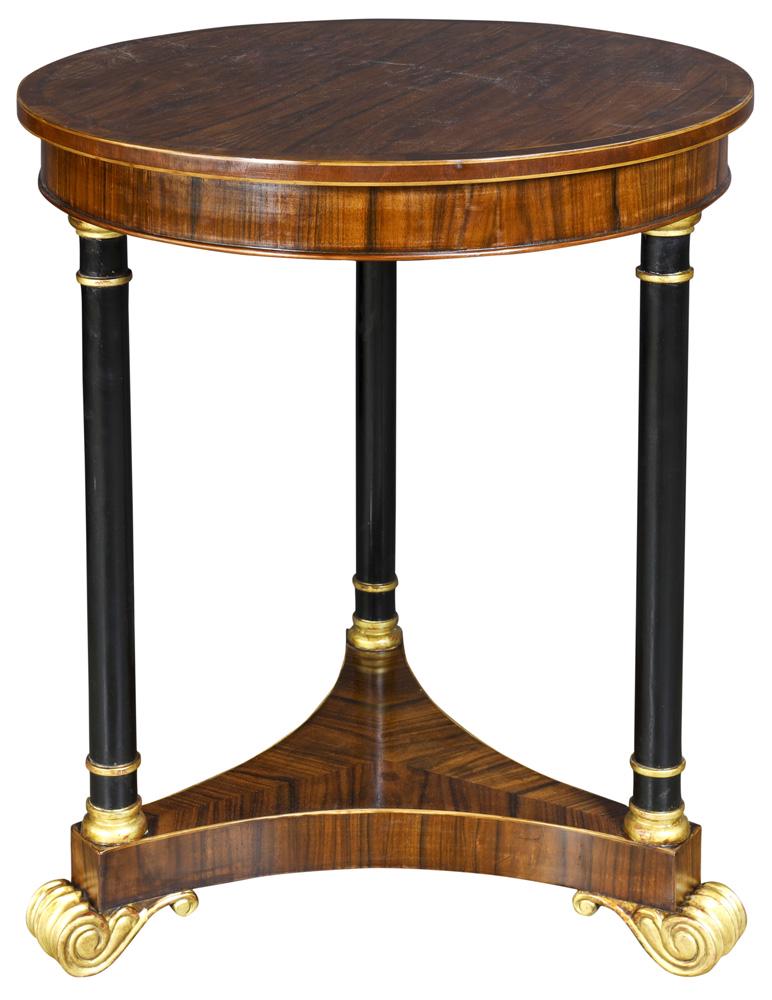 A French Empire style rosewood and partial gilt: A French Empire style rosewood and partial gilt gueridon, having a band inlaid top above the turned and ebonized supports continuing to the bookmatched rosewood lower tier, and rising on giltwood carv