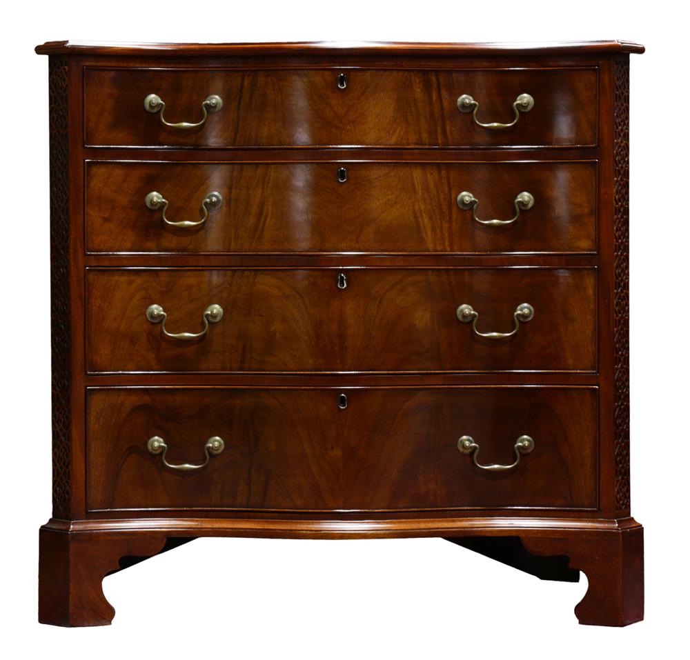A George III style serpentine chest of drawers: A George III style serpentine chest of drawers, executed in mahogany, and having a graduated four drawer case with cock bead fronts, and rising on bracket feet, 39.5"h x 42.5"w x 21"d