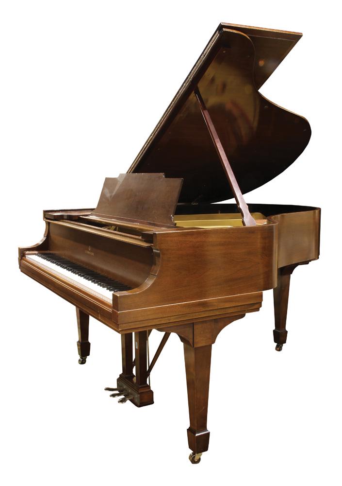 A Steinway and Sons Model M baby grand piano: A Steinway and Sons Model M baby grand piano, serial number 153752, retains original keys, having a walnut case, and rising on Marlborough feet terminating on casters, 38.5"h x 5'6"l