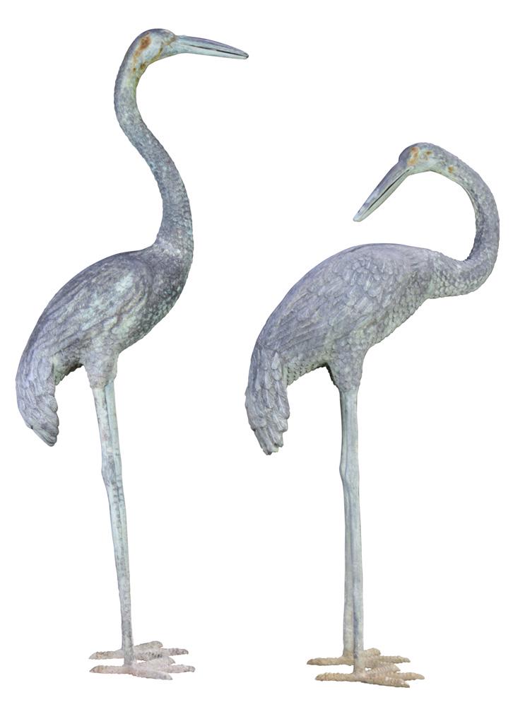A group of metal cranes: (lot of 3) A group of metal cranes, each depicted standing, one facing backward, another damaged, largest 68"h Provenance: The Estate of Robin Leach, proceeds to benefit charities including the Clevel