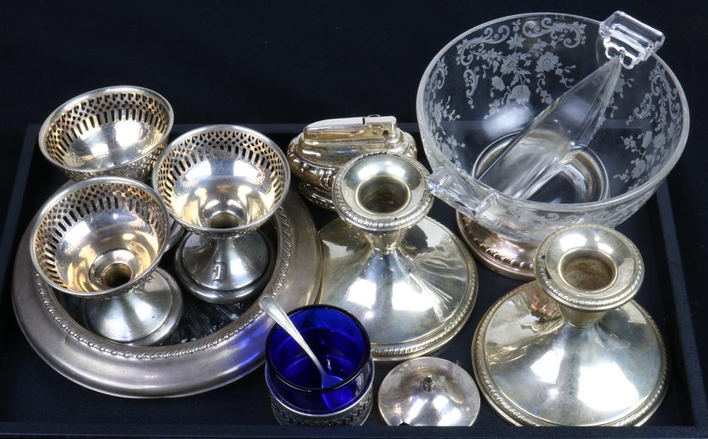 (lot of 11) Lot of sterling mounted and weighted silver: (lot of 11) Lot of sterling mounted and weighted silver table articles: a silver mounted wine bottle coaster; a silver mounted bisectional bowl; a sterling mounted cobalt blue glass mustard jar with s