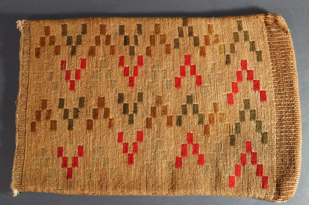 Pacific Northwest American Indian Nez Perce cornhusk: A Northwest Plateau American Indian Nez Perce cornhusk bag, early 20th Century, Columbia River Plateau, with repeating woven colored yarn geometric designs to both sides, 17.5"h x 12"w