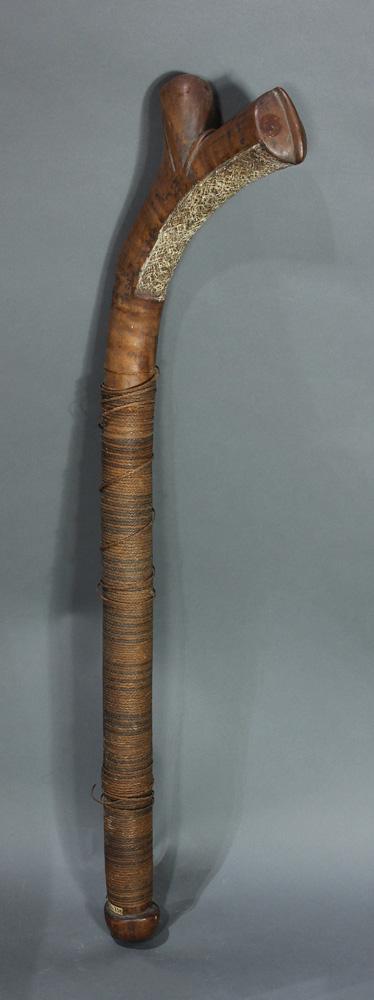 A Fijian rootstalk club, Polynesia: A Fijian rootstalk club, Polynesia, with elaborate and extensive woven wrapping, 33"h; Provenance: Richard I.M. Kelton Collection, Marina del Rey, California