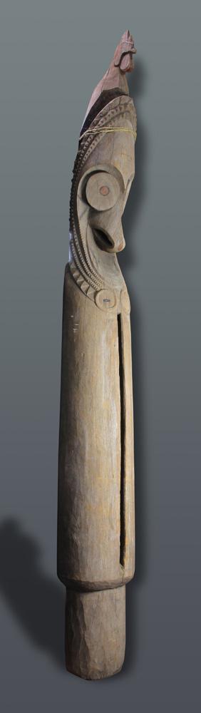 A slit gong drum, Tall Namba people, Ambryn Island: A slit gong drum, Tall Namba people, Ambryn Island, Vanuatu, Mid-20th Century, its tall forehead with a small dent, approx. 114"h; Provenance: Richard I.M. Kelton Collection, Marina del Rey, Californi