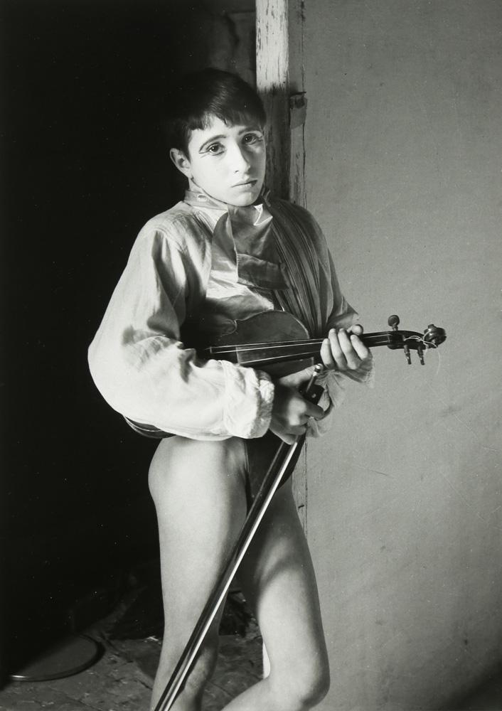 Photograph, Lucien Clergue: Lucien Clergue (French, 1934-2014), "Violinist," 1954, gelatin silver print, signed lower right, printed 1983, image: 10.75"h x 7.5"w, sheet: 12"h x 8.75"w, overall (with mat): 20"h x 16"w