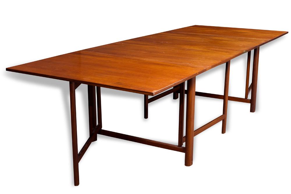 A Danish Modern expanding table: A Danish Modern expanding table, in the manner of Bruno Mathsson, having a rectangular top above adjustable legs, unsigned, 28"h x 9'2" x 43"d