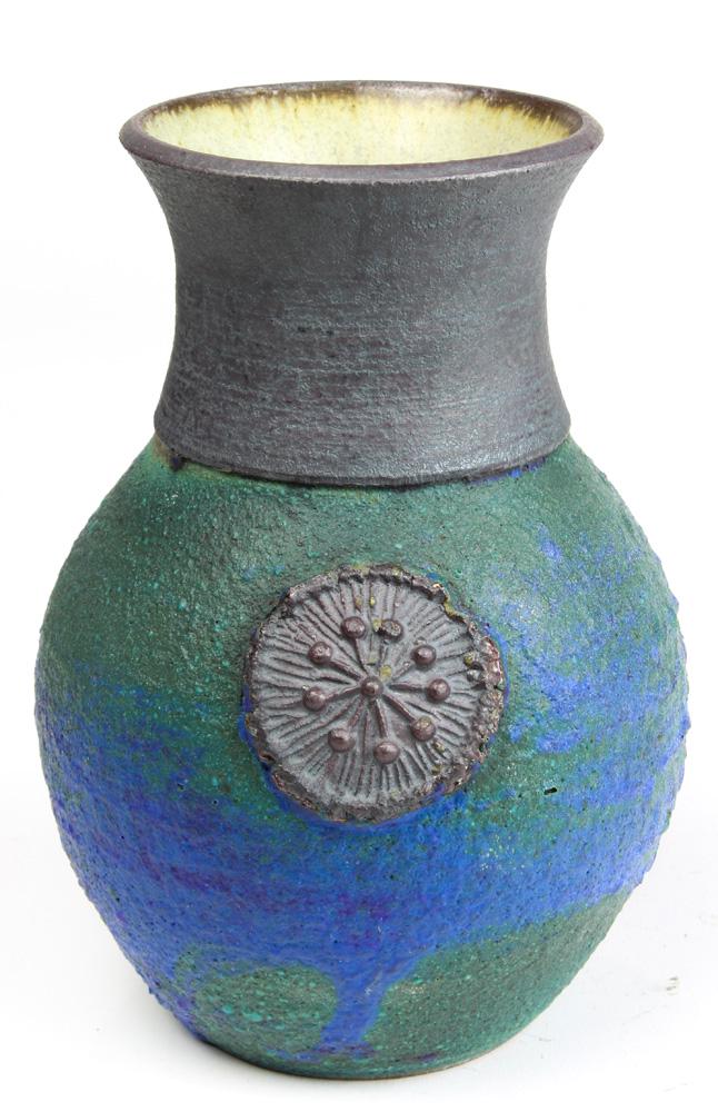 A James Lovera (1920-2015) vase: James Lovera (1920-2015) vase, the tapered form having a blue glaze centered with a geometric decorated stamp, signed on bottom "Lovera," 6"h