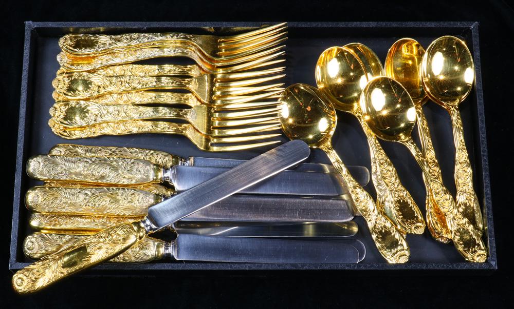 Tiffany & Co Chrysathemum sterling gilt 24 pc set 42toz: (lot of 24) A Tiffany & Co Chrysathemum sterling gilt flatware set: (8) dinner forks 7.5" l; (8) dinner knives with plated blades 10" l; (8) old style ice cream spoons 6.5"l, total weighable 42 toz, P