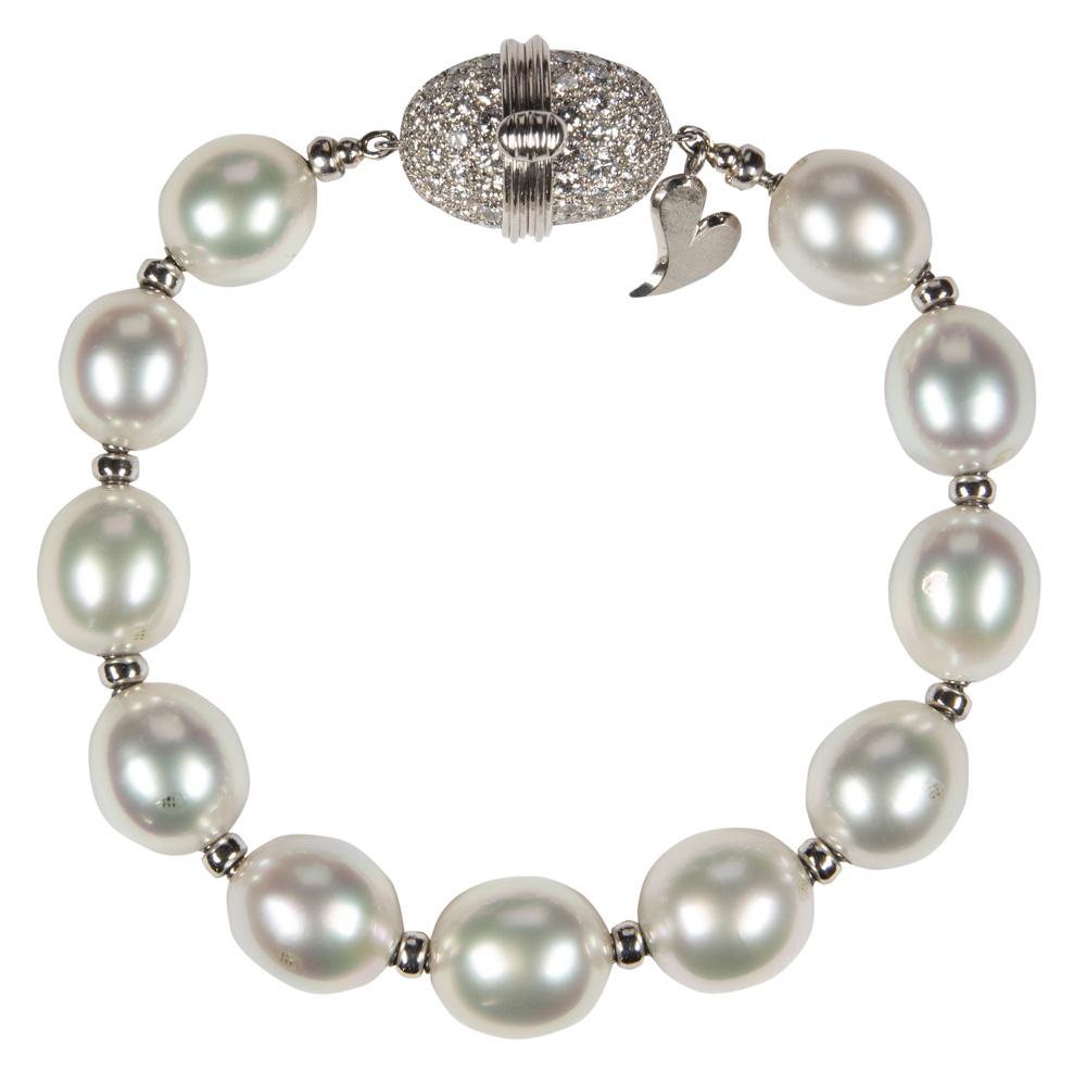 Henry Dunay, South Sea cultured pearl, diamond,: Henry Dunay, South Sea cultured pearl, diamond, platinum bracelet Composed of (11) oval shaped South Sea cultured pearls, measuring approximately 13 X 11 mm, interspaced by a platinum, 3.5 mm, rondell