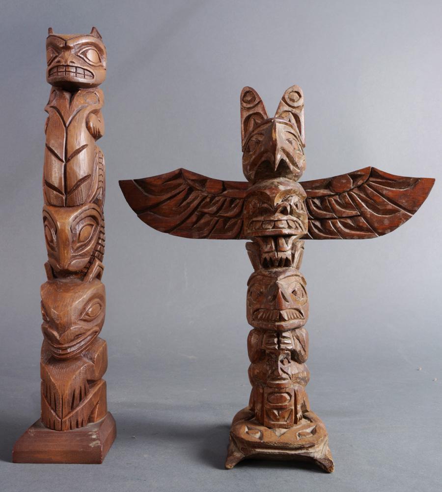 (lot of 2) A grouping of Pacific Northwest carved wood: (lot of 2) A grouping of Pacific Northwest carved wood totem poles, 12.5"h