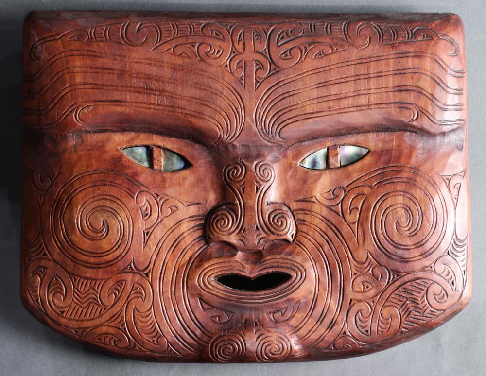 Modern Maori carved wood mask: Modern Maori carved wood mask, having inlaid shell eyes, 8.5"h x 10.5"w