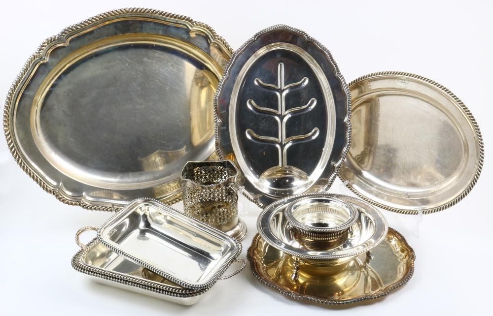 (lot of 10) Assembled lot of silver plate serving: (lot of 10) Assembled lot of silver plate serving pieces with gadrooning: (4) trays, including a large oval serving tray 22"d and an International well and tree platter; (3) square entree or vegetable