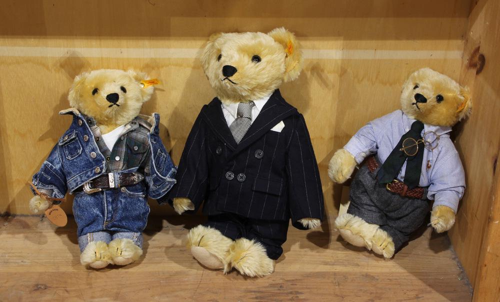German Steiff Mohair Teddy Bear group: (lot of 3) German Steiff Mohair Teddy Bear group, each with fitted clothes, largest: 14"h
