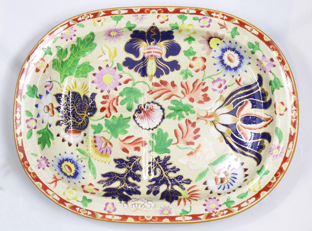 Spode Imari well and tree partial gilt decorated: Spode Imari well and tree partial gilt decorated platter, in the Japanese taste, having floral sprays on a cream ground, 20.5"w
