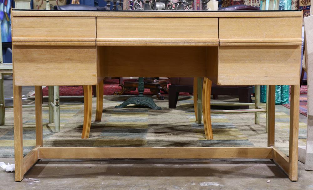 (lot of 2) Paul Laszlo for Brown Saltman blond kneehole: (lot of 2) Paul Laszlo for Brown Saltman blond kneehole desk with glass top, 30"h x 50"w 26"d