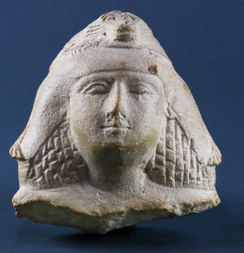 An Egyptian limestone male head (1 of 3)