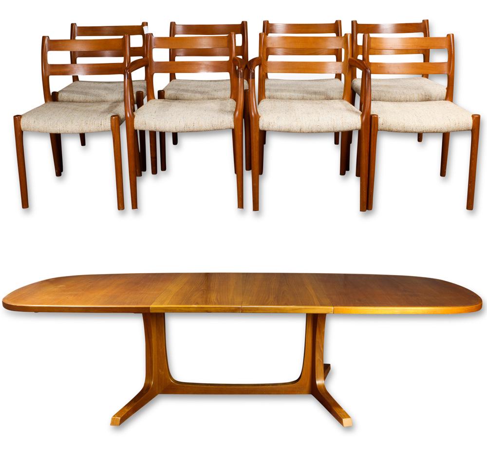 A Danish Niels Moller for Gudme Mobelfabrik teak dining: A Danish Niels Moller for Gudme Mobelfabrik teak dining table, the outset top with demilune ends and two 19" leaves, rising on a trestle base, with (8) ladder back chairs with tweed upholstery, stampe