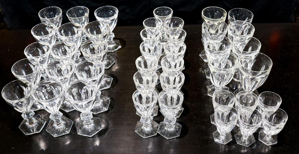 A collection of Baccarat: (lot of 50) Collection of Baccarat including (15) sherries, (13) cordials, (8) standard sweet glasses, (8) port glasses (one is larger and associated), and (6) shot glasses, largest: 4.5"h. Provenance