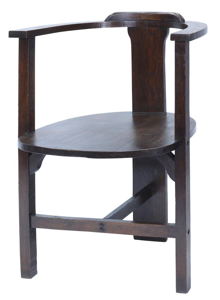 An Arts and Crafts oak captain's chair (1 of 3)