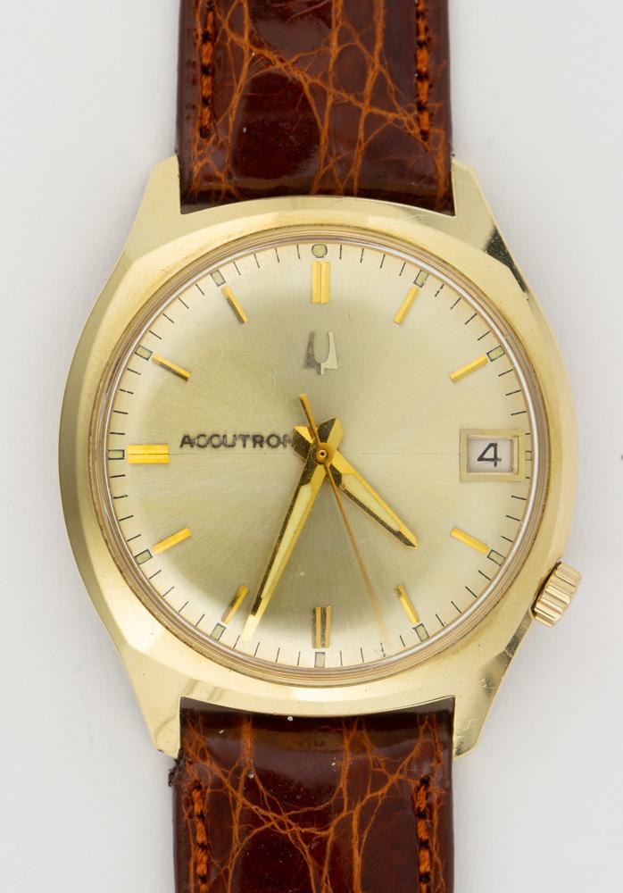 Bulova Accutron, 14k yellow gold, metal wristwatch (1 of 2)