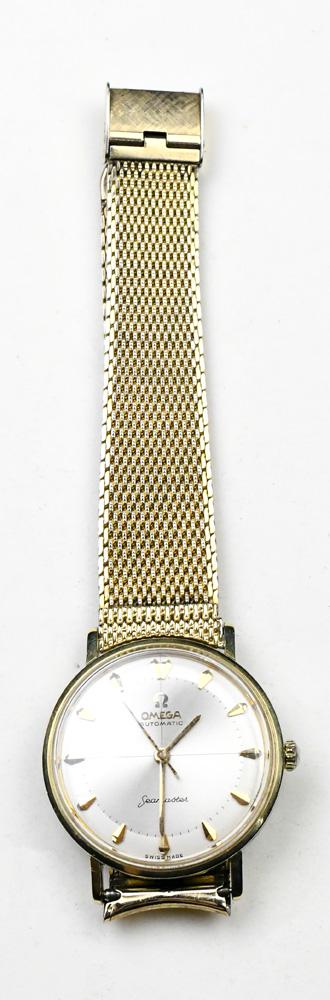 Omega Seamaster automatic stainless steel, 10k: Omega Seamaster automatic stainless steel, 10k gold-filled wristwatch Dial: round, pie pan, bi-leveled, applied gold tone arrowhead hour marker; inner black minutes track, center quadranted, gold tone