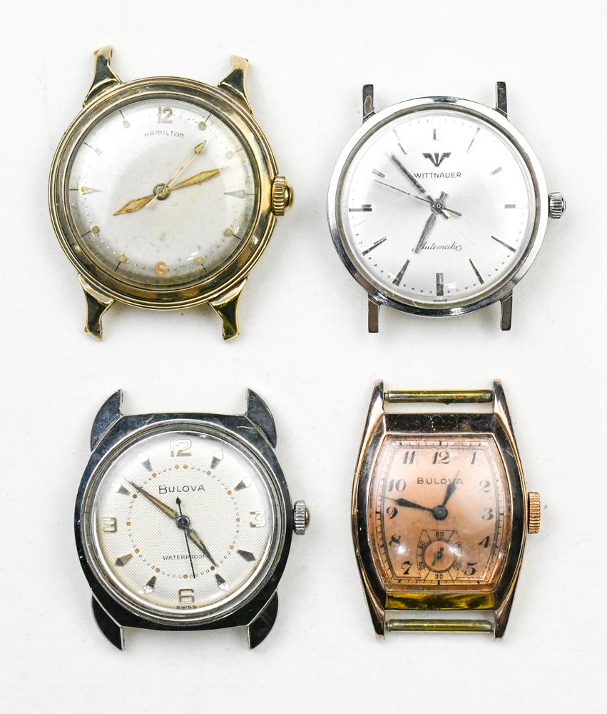 (Lot of 4) Metal wristwatches: (Lot of 4) Metal wristwatches Including 1) Hamilton, round, 10k gold-filled, stainless steel, 33mm wristwatch; 1) Wittnauer automatic, round, stainless steel, 31 mm wristwatch; 1) Bulova, round, stain