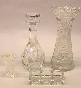 Pressed/cut tableware: Group of press/cut and brilliant cut crystal items including a brilliant cut crystal flower vase decorated with daisies, a decanter and other table items