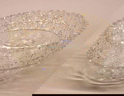 Brilliant cut crystal bowl: American brilliant cut crystal bowl, decorated with daisies, sawtooth rim with minor losses to the teeth, 4''H x 8'' dia