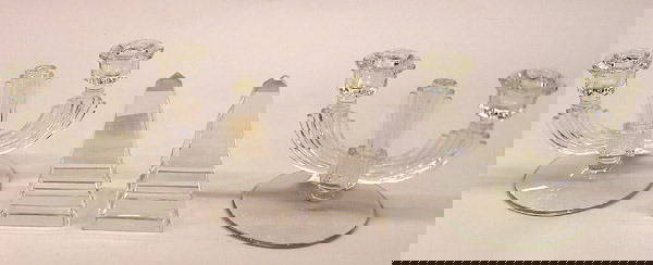 Art Deco candelabra and crystal obelisks: Pair of Art Deco 5.25'' glass two-light candelabra together with a pair of crystal obelisks, 5''H