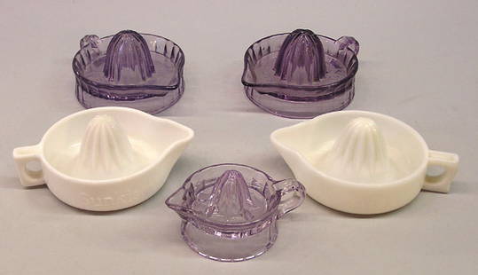 5 depression glass Sunkist juicers: Five depression glass Sunkist juicers: 3 amethyst and 2 in milk-glass