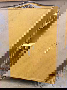 Pair of blondewood armoires: Pair of circa 1930 Continental Biedermeier style blondewood two door armoires