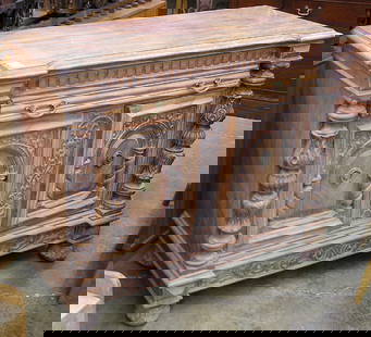 Renaissance style cabinet, c. 1920: Renaissance style carved oak two door side cabinet c. 1920 with later limed finish