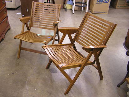 Krudi bent plywood folding chairs: Pair of Krudi bent plywood folding chairs 29''h x 24''d x 23''w