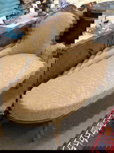 Carved upholstered chaise: Carved framed upholstered chaise lounge