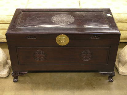 Chinese mahogany chest: Chinese mahogany chest decorated with symbols of prosperity, the whole on paw feet 40''w x 20''d x 23''h