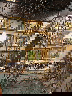 Wrought iron arbor with bench: Wrought iron arbor with bench