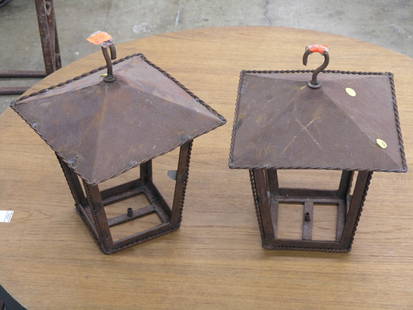 Wrought iron hanging lanterns: Pair of wrought iron hanging lanterns