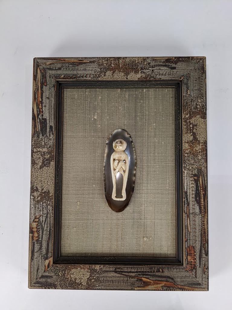 A carved figure of a monkey on a stone geode form: Carved figure of a monkey on a stone geode form plaque, mounted on a frame, 10.5"h x 8"w Provenance: Property from the estate of late comedian / actor, Mr. Robin Williams Tiburon (CA) Provenance: Prop