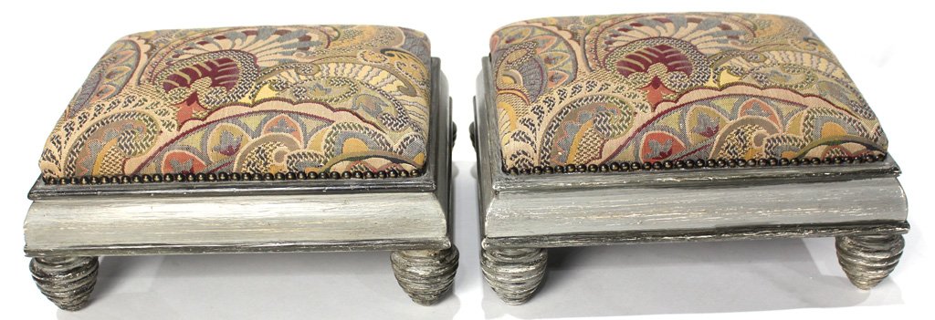Moderne footstools, each having a retangular cushion: Moderne footstools, each having a retangular cushion with Brunswig & Fils fabric accented with brass nail head trim, and rising on turned legs 6"h x 11"w x 13"d
