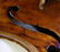 An antique violin, having a maple body with spruce top, - 5