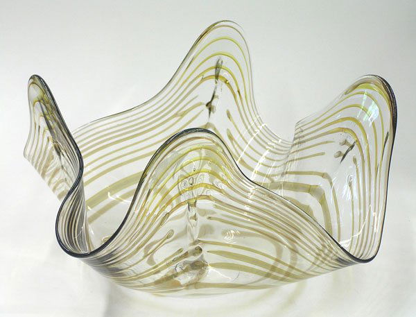 Freeform contemporary art glass bowl: Freeform contemporary art glass bowl, clear with golden ochre stripes, signed Peter Bramhall, January 12, 1982, 9.5''h x 17''w x 17''d