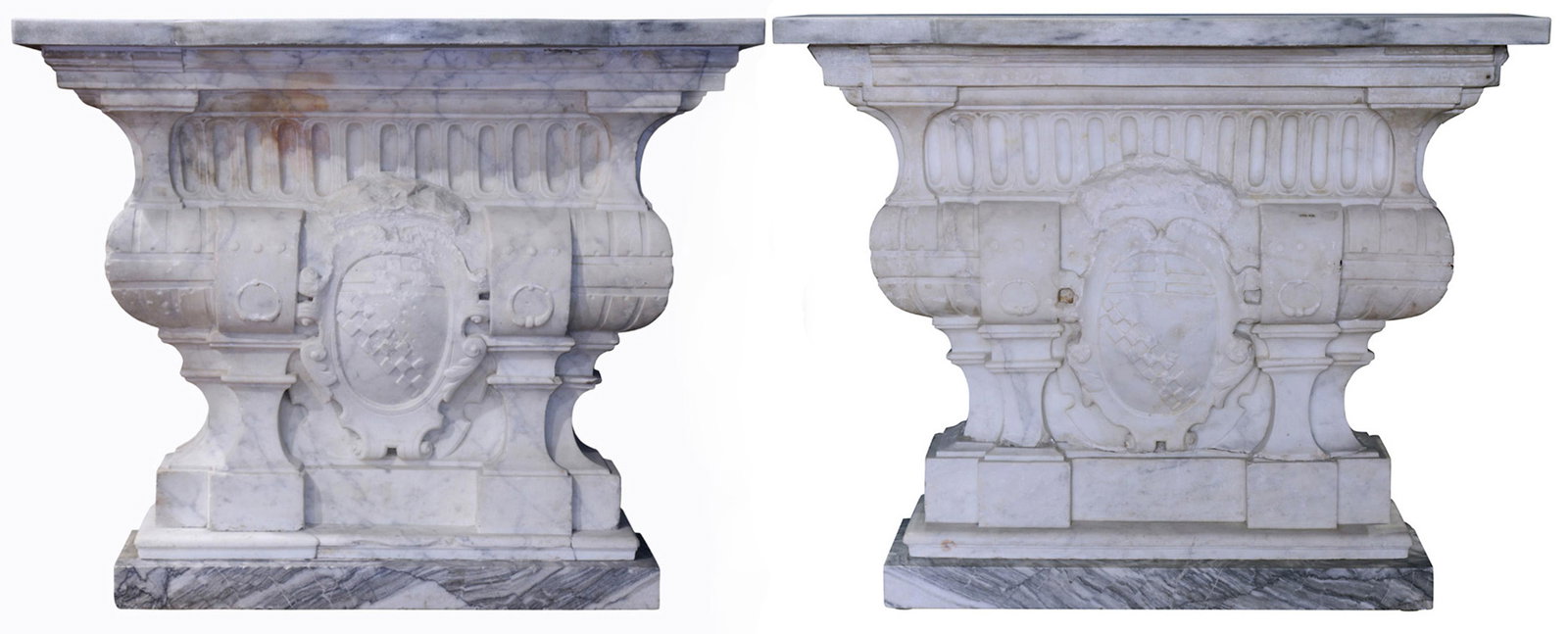 A pair of Continental marble architectural elements: Pair of Continental marble architectural elements adapted to console tables, composed of 17th century and later elements, each centered with a shield form cartouche, 30.5"h x 38"w x 9.5"d